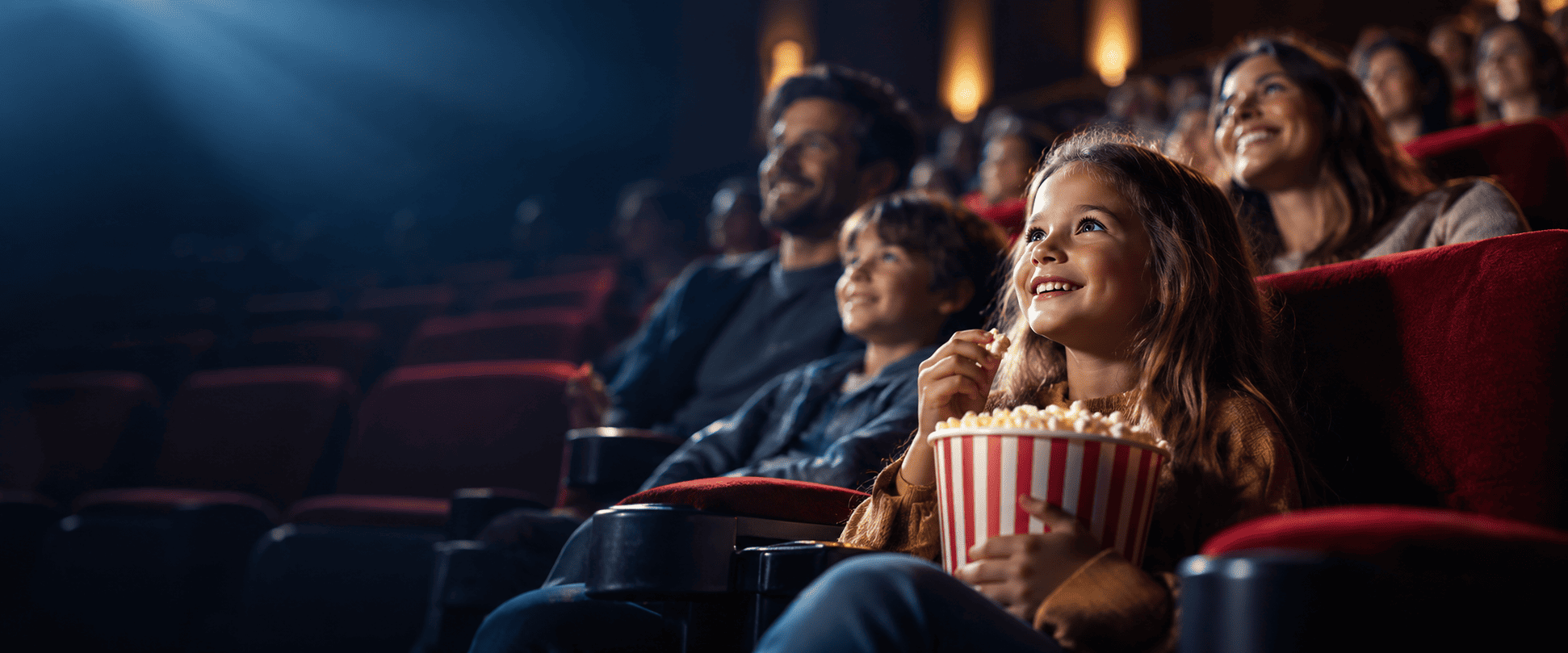 Family enjoying movie night with popcorn